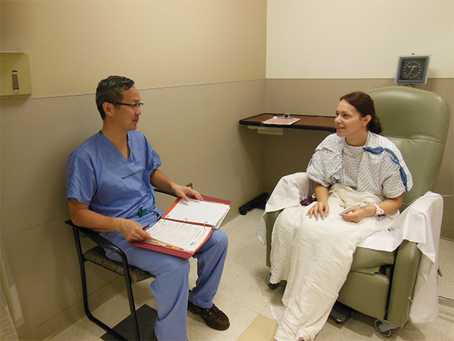 Dr. Lo with patient